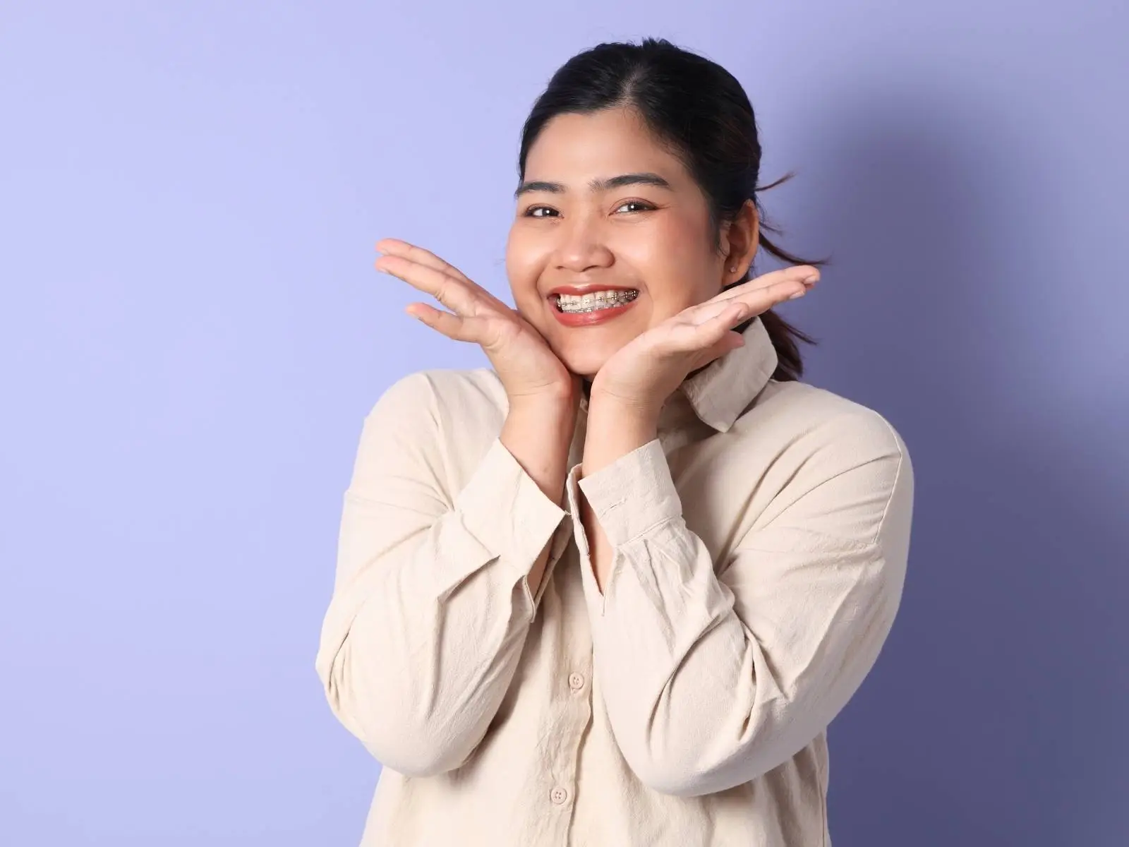 woman smiling with braces