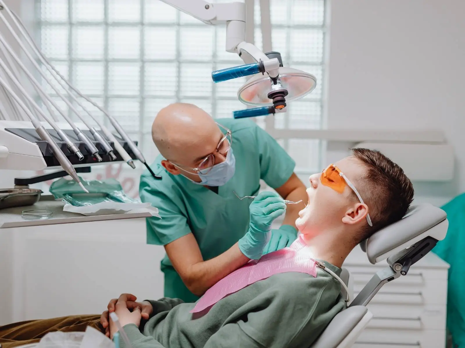 dentist examining patients teeth