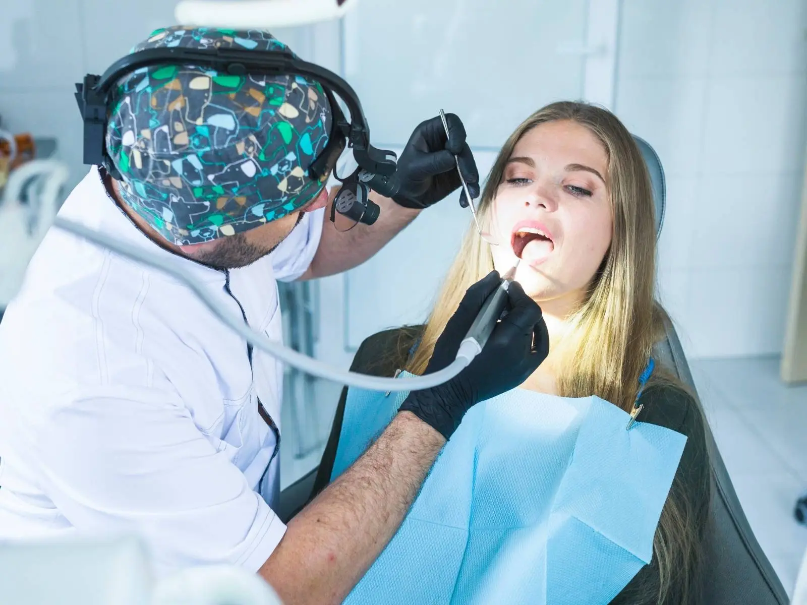 dentist looking at teeth