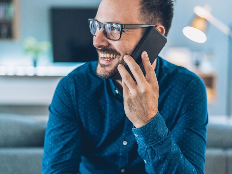 dad smiling on the phone
